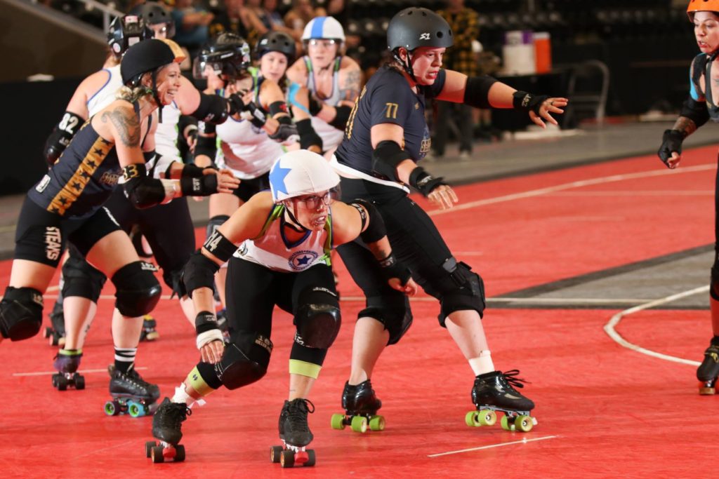 Jammer Bazinga skates out of the pack vs. Tucson at the WFTDA Continental Cup